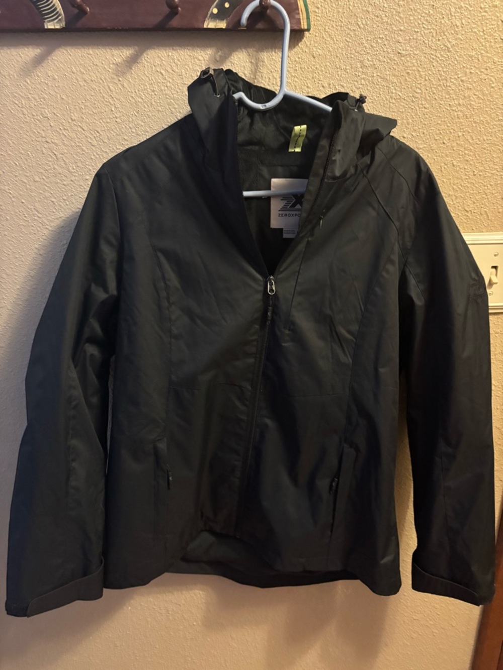 ZeroXposur Black Jacket with White Logo Tag